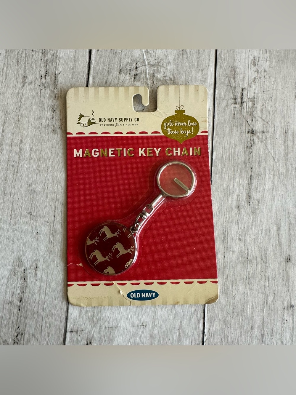 VINTAGE OLD NAVY MAGNETIC KEY CHAIN RED CIRCLE REINDEER HOLIDAY CHRISTMAS PRINT